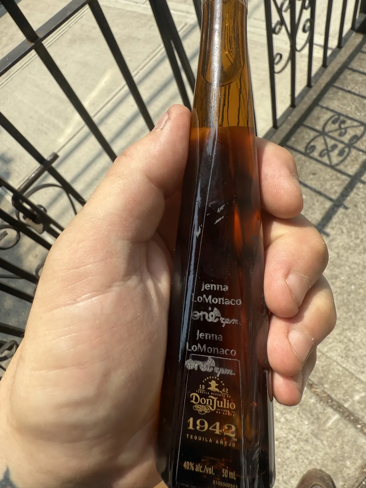 A Don Julio bottle laser-engraved live at an event