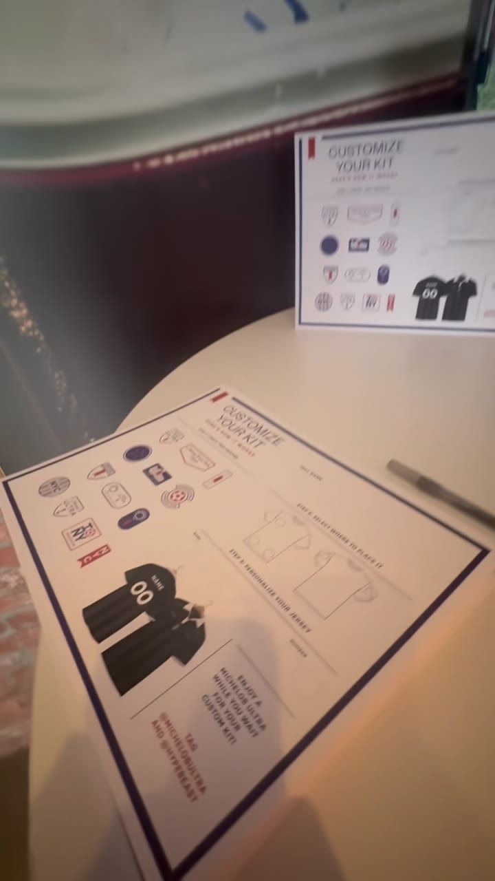 Close-up of the guest-facing Customize Your Kit order sheet at the Michelob booth — pick your patches, pick your placement